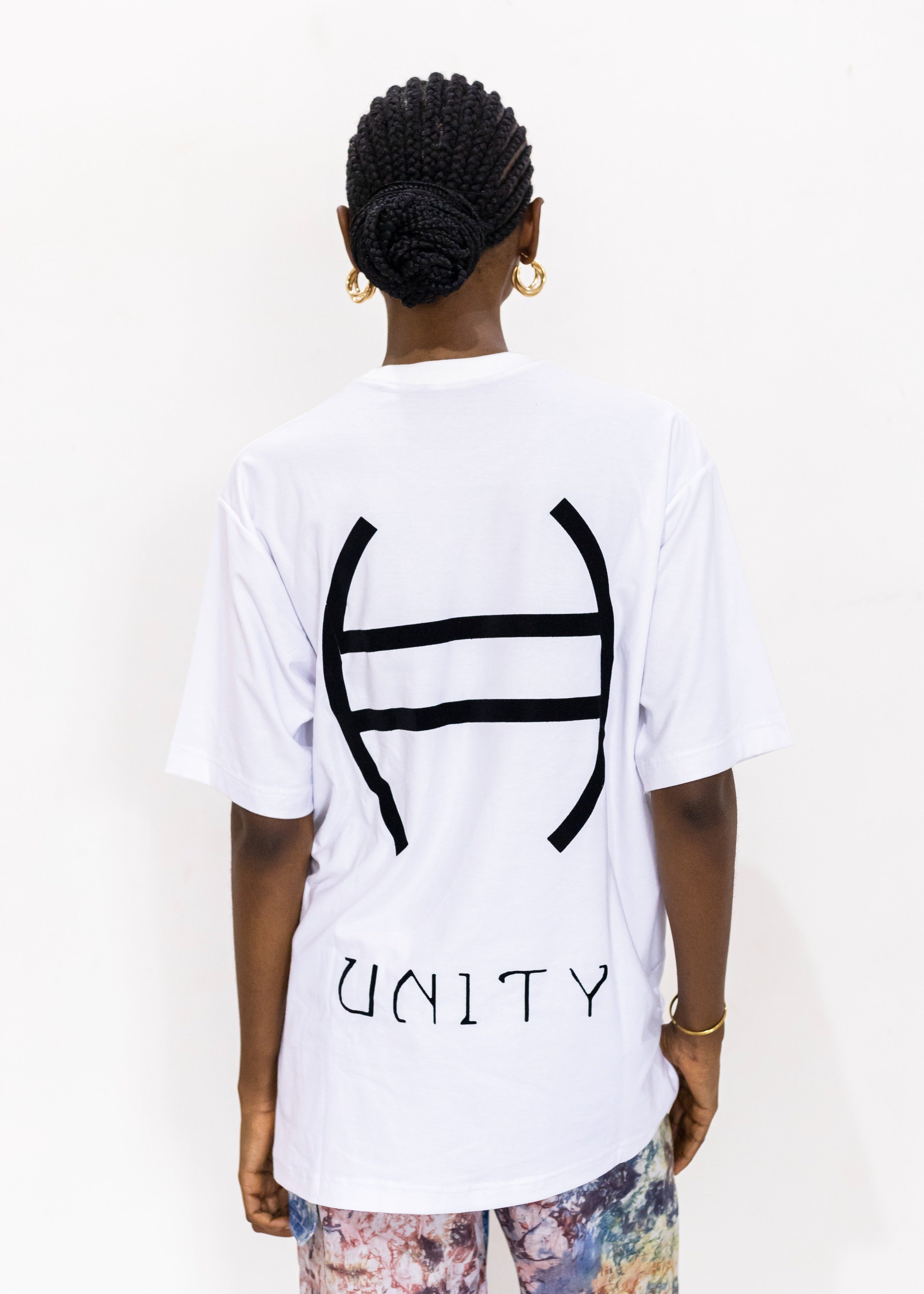 Shayo Fashion Peace Tee white unisex t-shirt with Nsibidi symbol for Unity, Nigerian made cotton streetwear