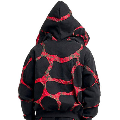 Black and red patterned hoodie and pants set on a white background. Reverse image